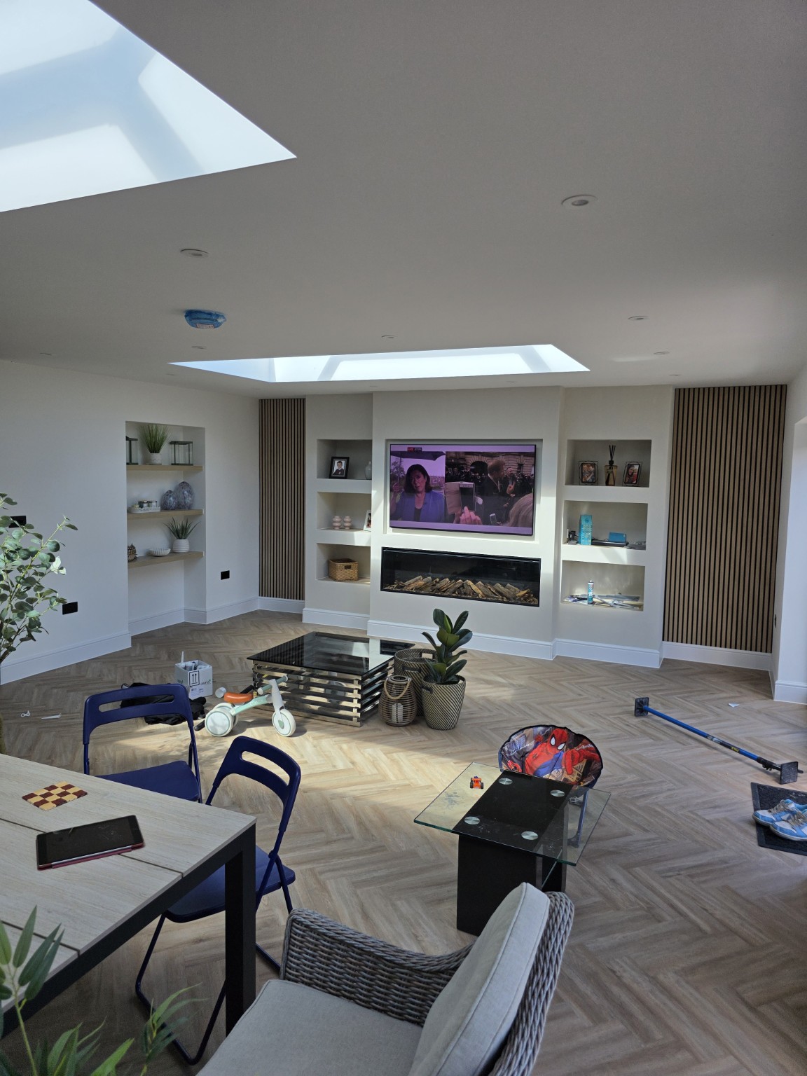 Bright renovated living space with roof lights